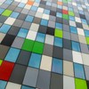 Geometric pattern of colorful squares in a modern architectural design.